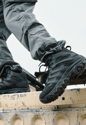A person wearing Merrell work shoes on the job.